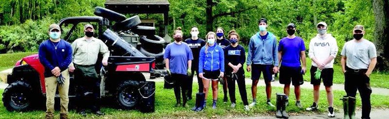 Students cleaning up trash